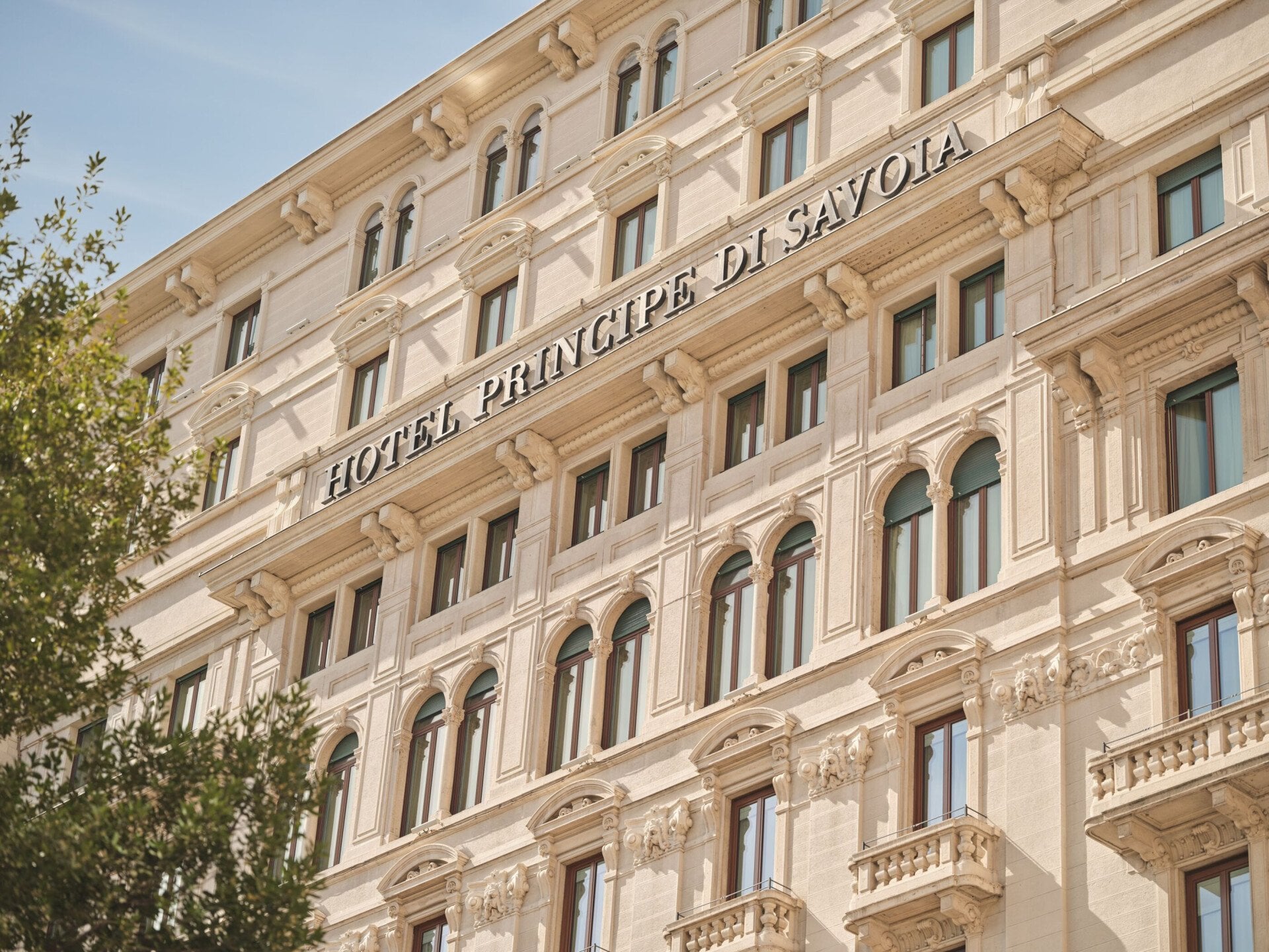 Our neoclassical facade, with a blue sky in the background.