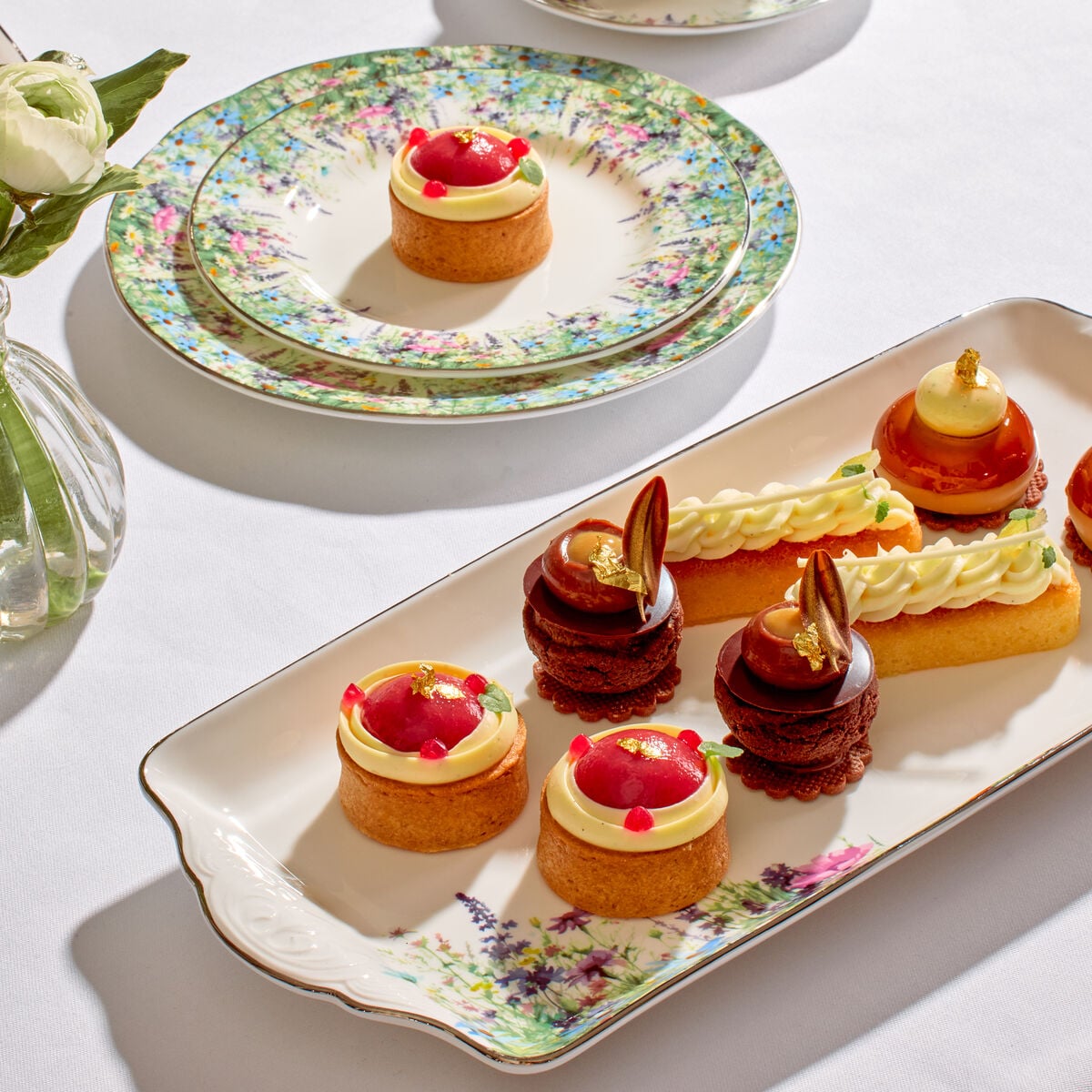 Afternoon tea served in the Drawing Room garden at Coworth Park, Ascot