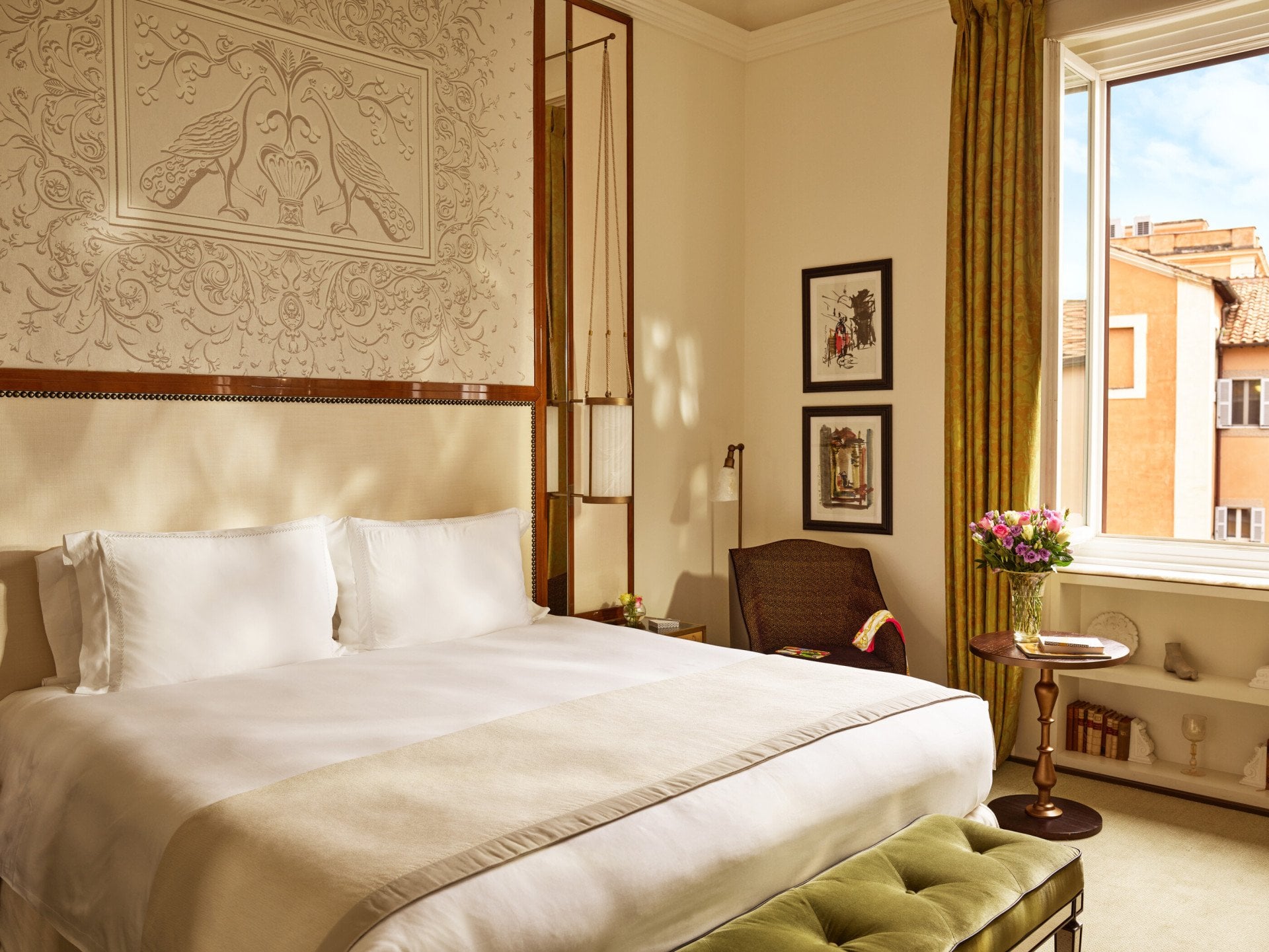 Bedroom of prestige room, headboard with peacocks illustration and window with view, at Hotel Eden, Rome