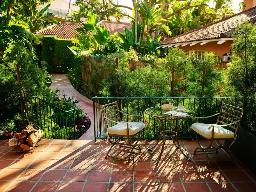 Bungalow Room Patio with glasses, script and coffee