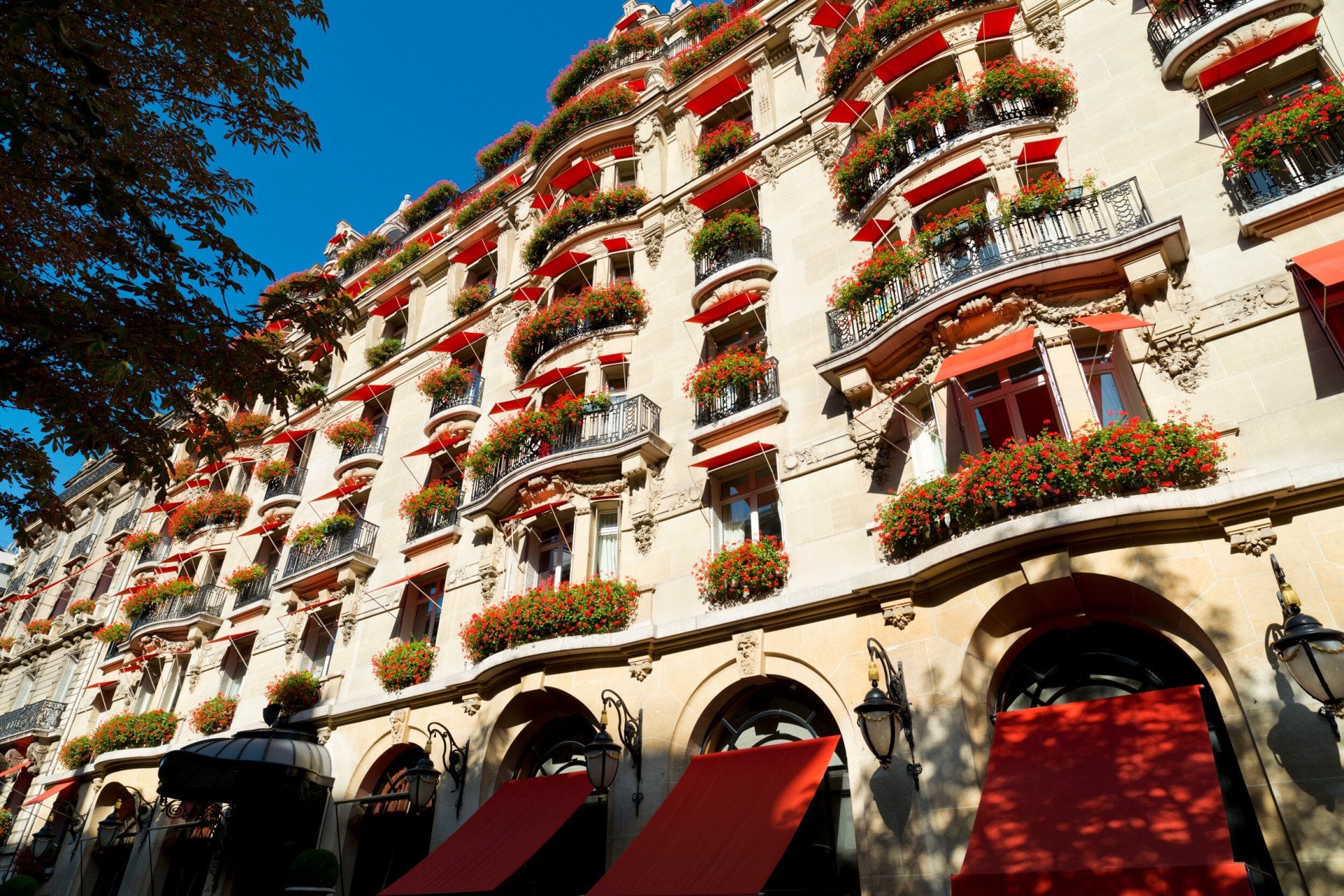 Hôtel Plaza Athénée building facade on a sunny day in Paris