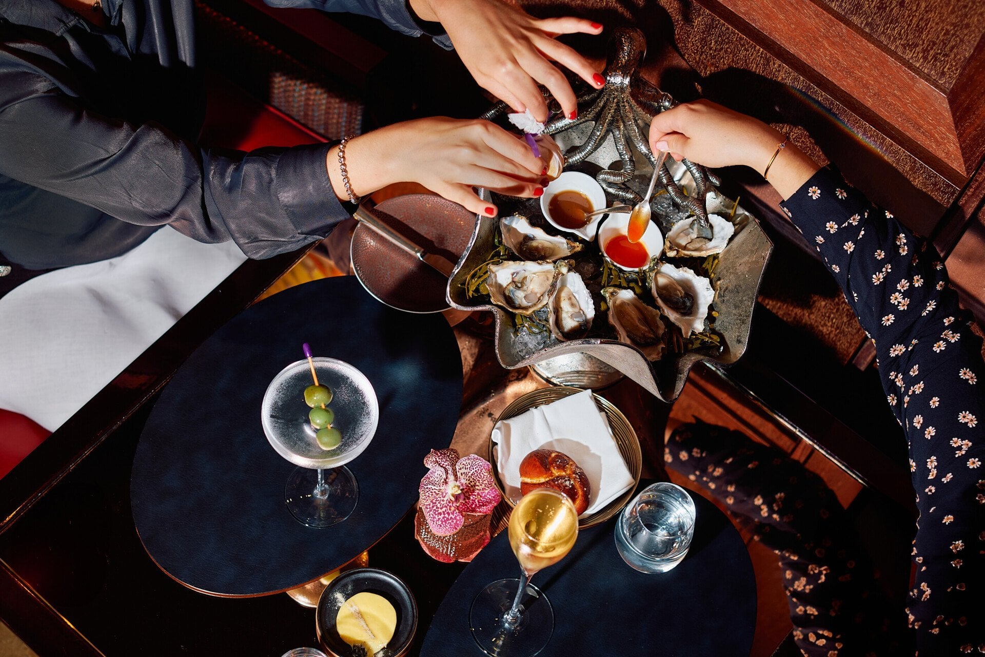 Woman looking out window of Park Lane Studio